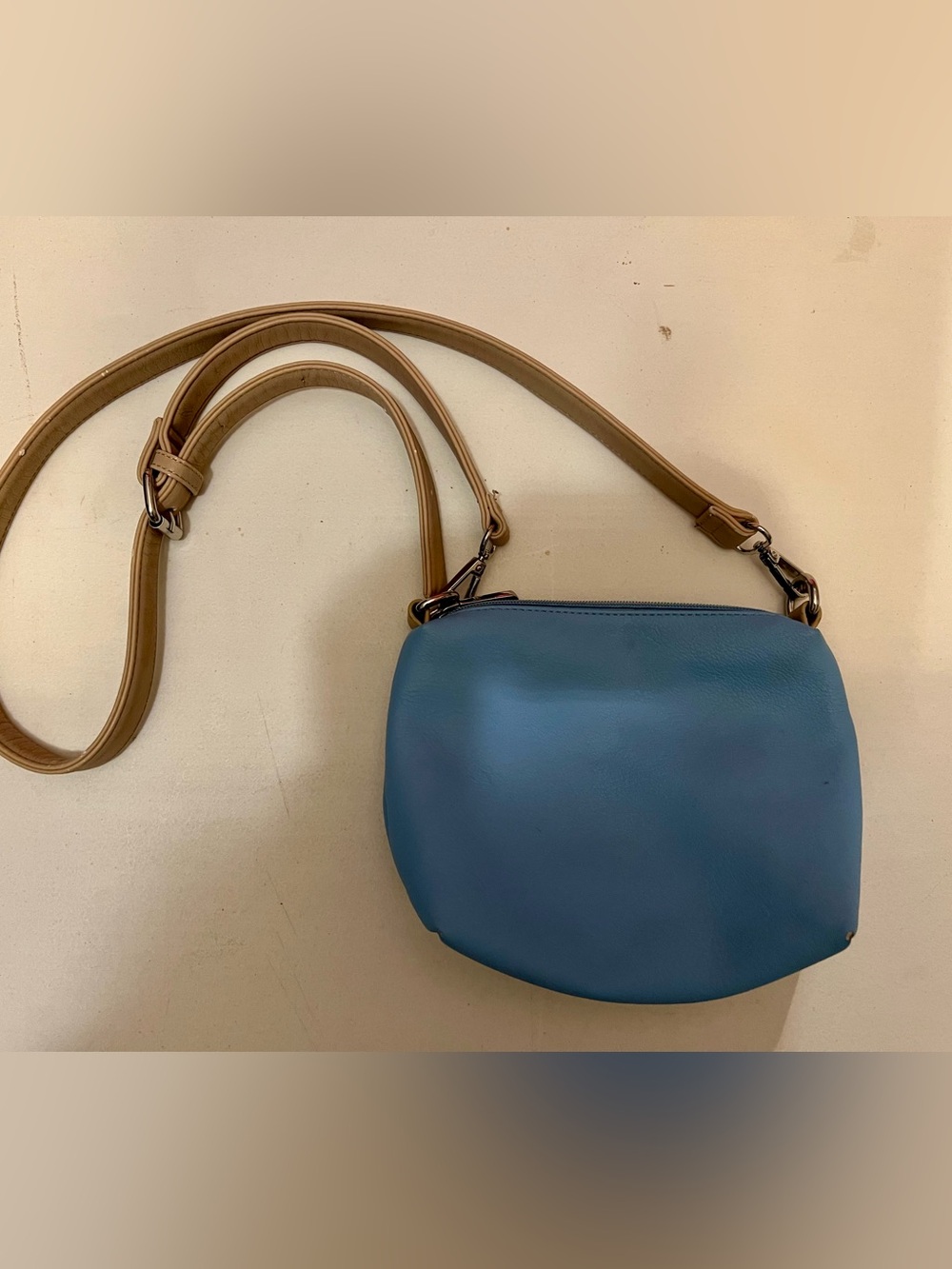 Charming Charlie Blue Crossbody Bag with Tan Strap